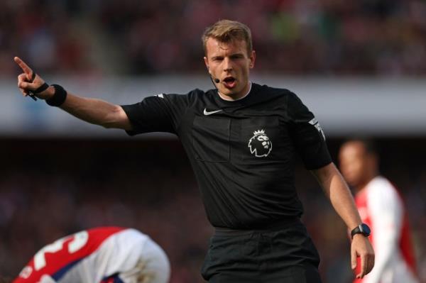 Sam Barrott pictured refereeing the Arsenal game against Leicester City